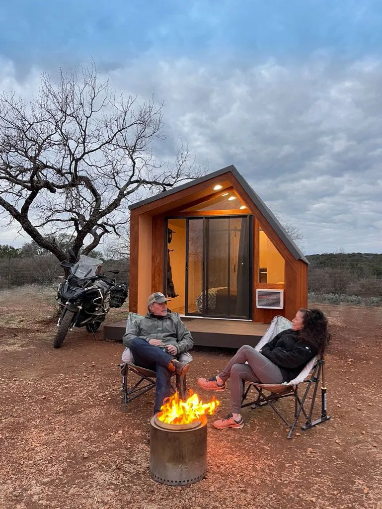 Relaxing by campfire at dusk